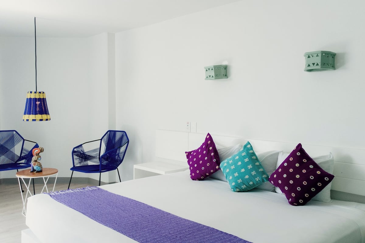 Junior Suite King Ocean View | In-room safe, blackout drapes, iron/ironing board, Internet