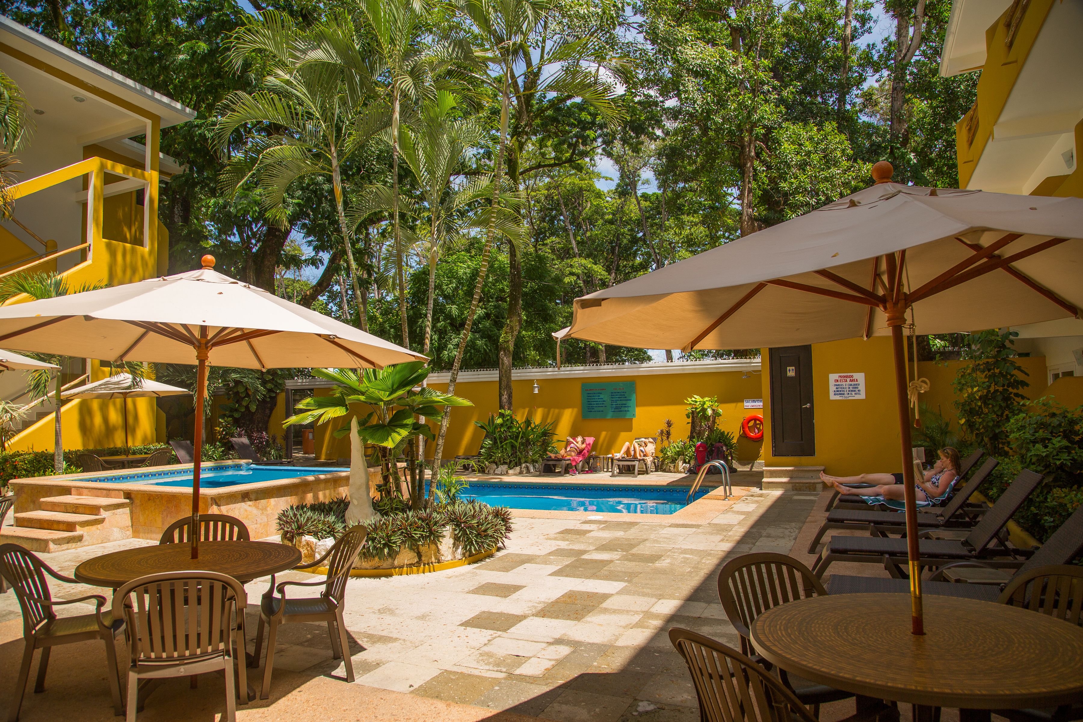 outdoor pool, pool umbrellas, pool loungers