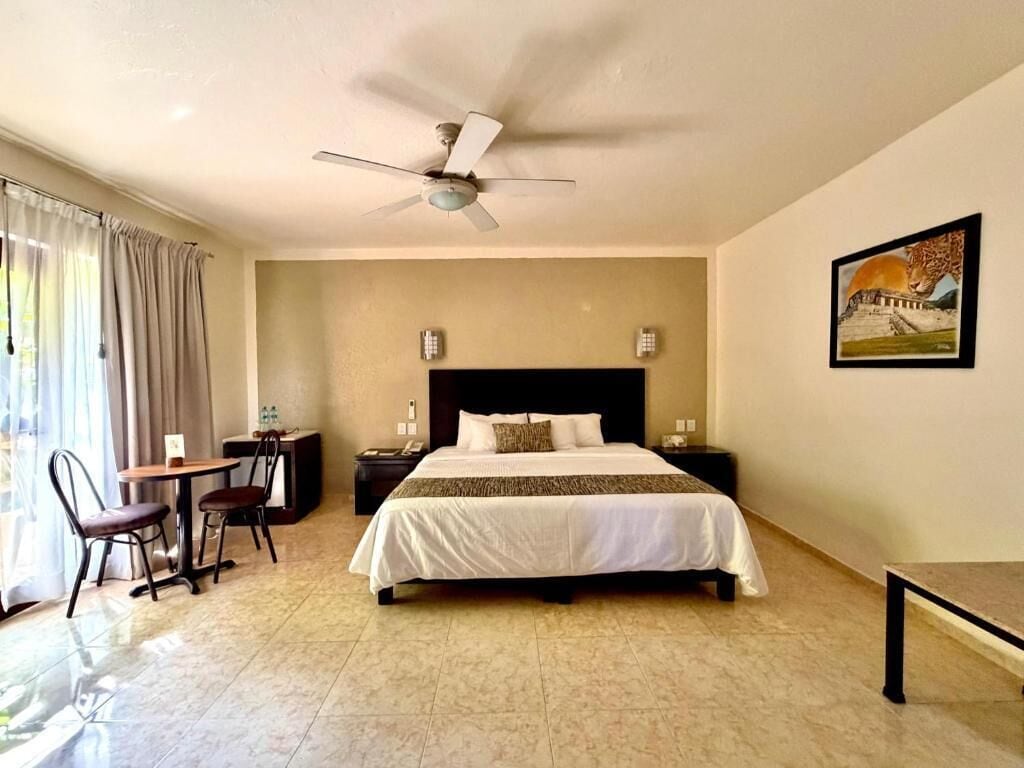 Standard Room, 1 King Bed, Balcony | In-room safe, iron/ironing board, free cots/infant beds, rollaway beds