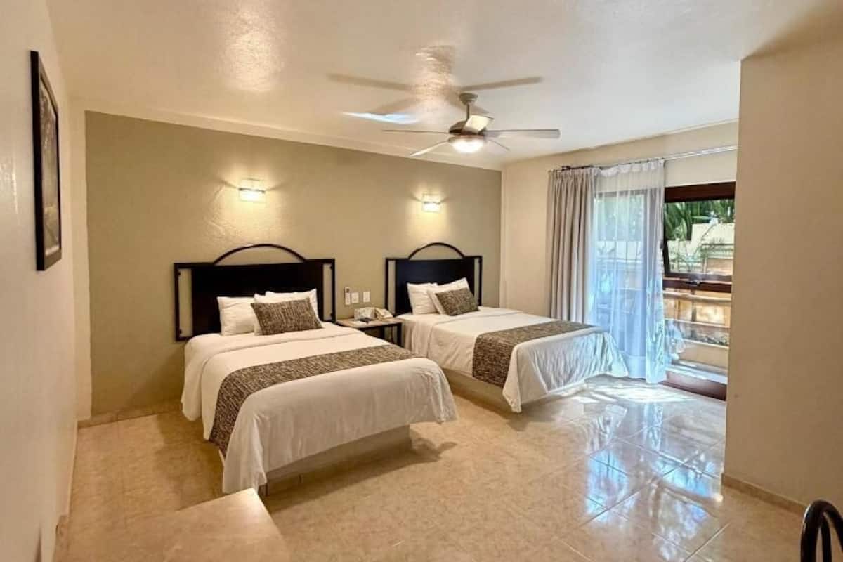 Standard Double Room, Balcony | In-room safe, iron/ironing board, free cribs/infant beds, rollaway beds