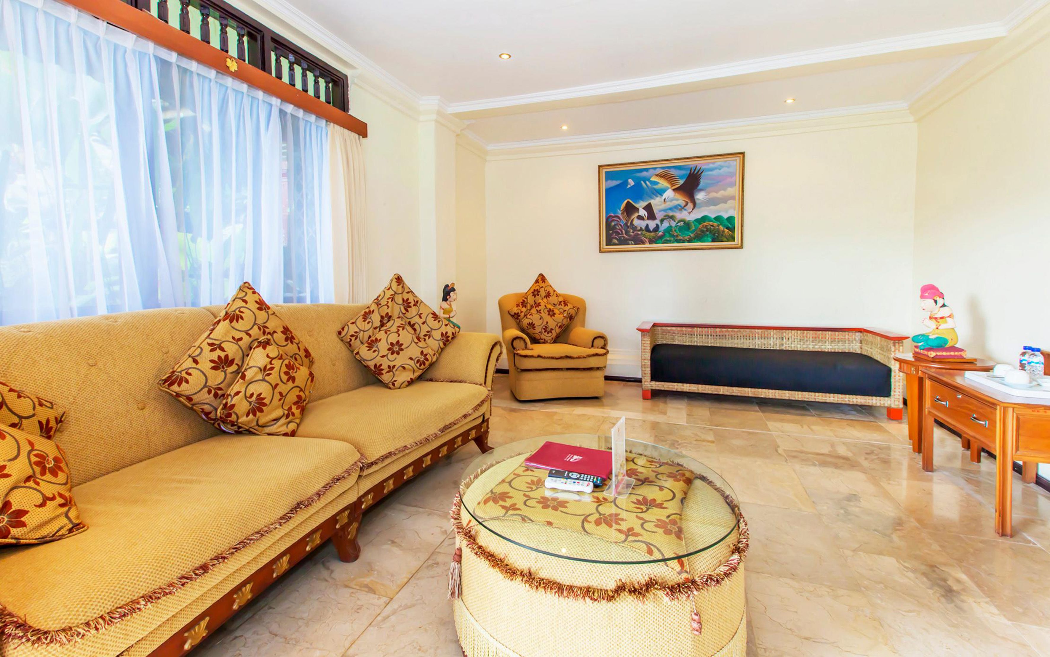 executive suite, 1 double bed, balcony, river view | living area | flat-screen tv, dvd player