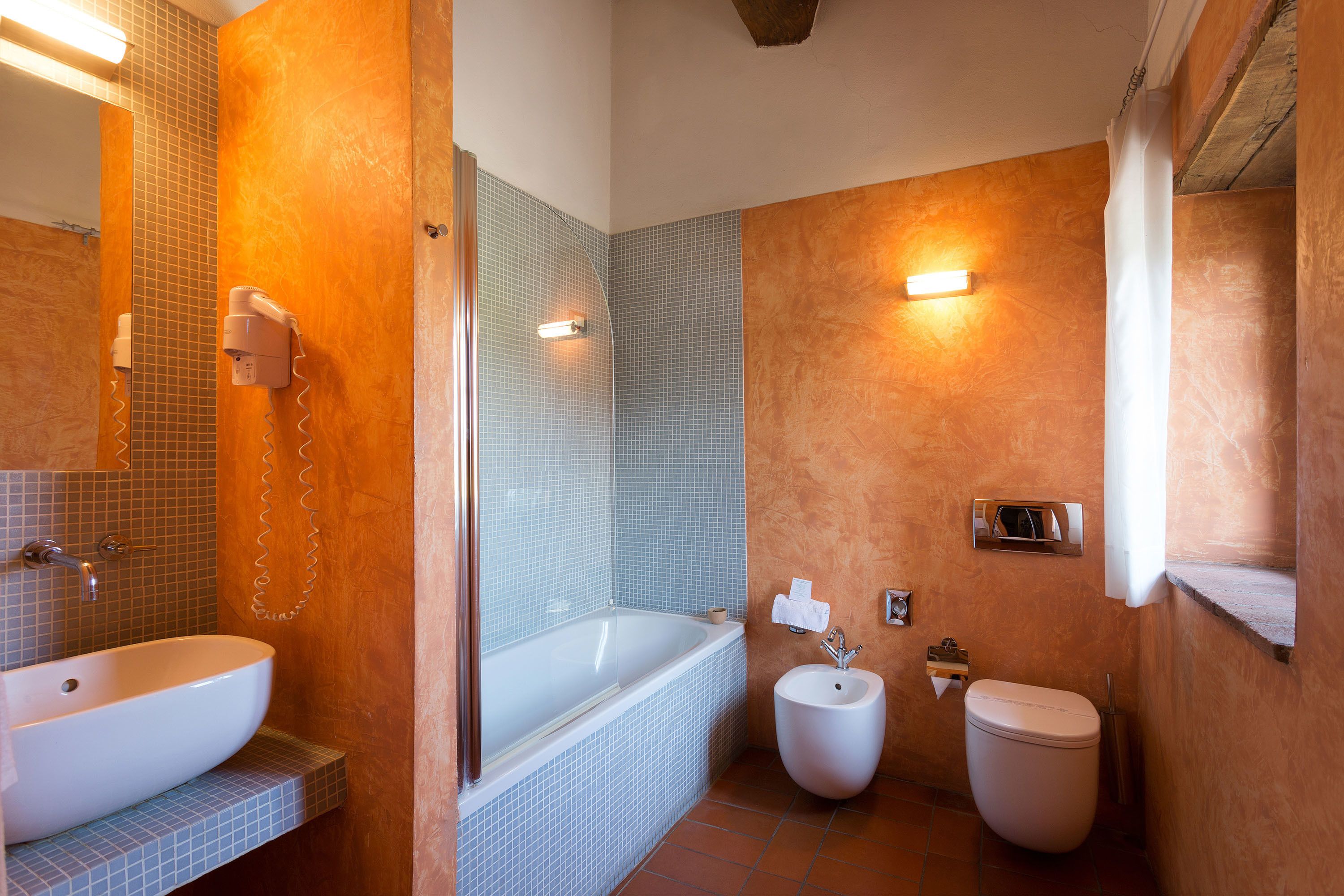 superior double room | bathroom | free toiletries, hair dryer, bidet, towels