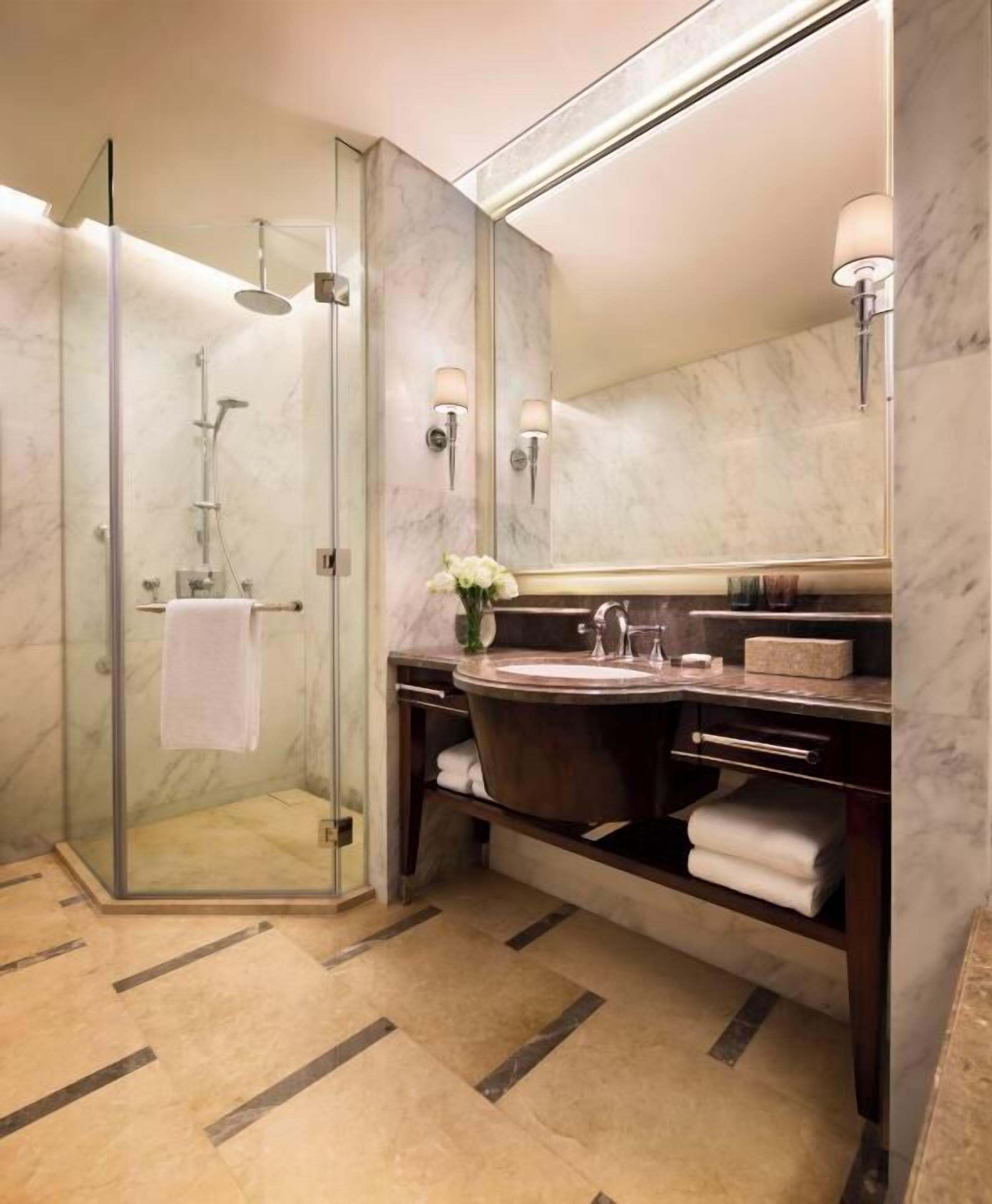 deluxe room, 1 king bed | bathroom | separate bathtub and shower, deep-soaking bathtub