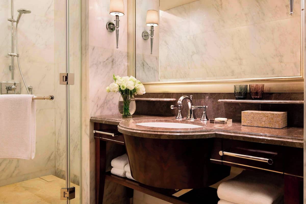 separate bathtub and shower, deep-soaking bathtub