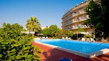 Outdoor pool, pool umbrellas, pool loungers