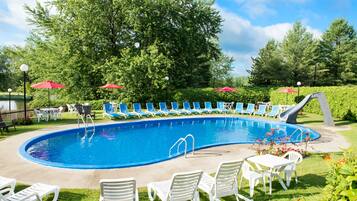 Indoor pool, seasonal outdoor pool, pool umbrellas, pool loungers