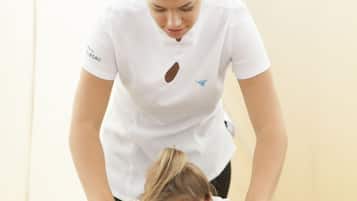 Expert therapists offer soothing massages in a serene, space.