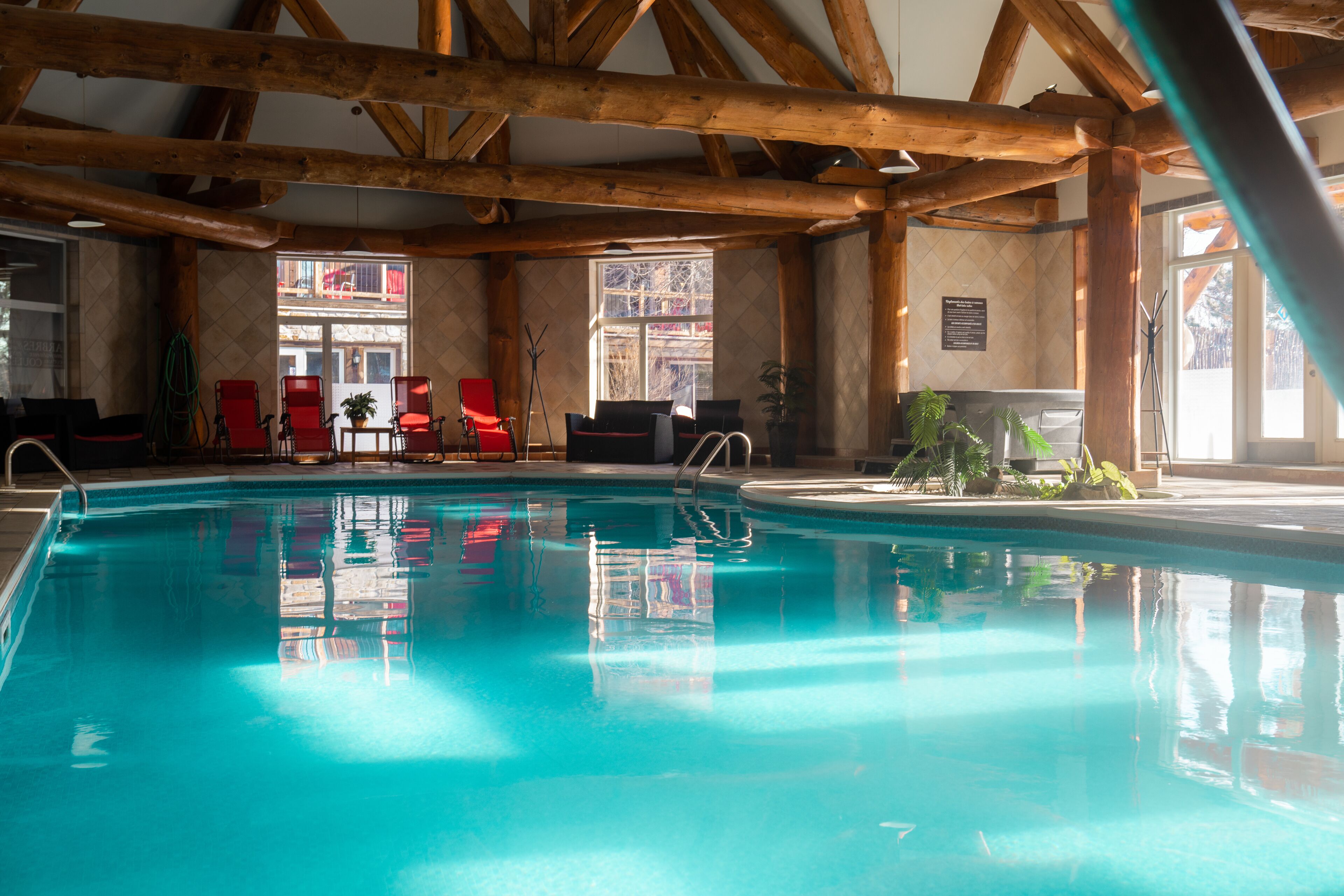 indoor pool, outdoor pool, open 9:00 am to 10:00 pm, pool umbrellas