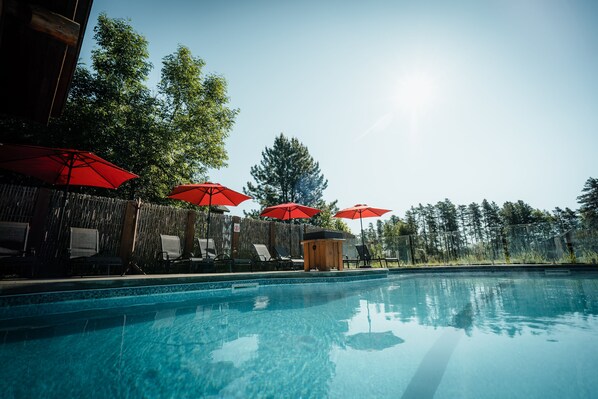 Indoor pool, outdoor pool, open 9:00 AM to 10:00 PM, pool umbrellas
