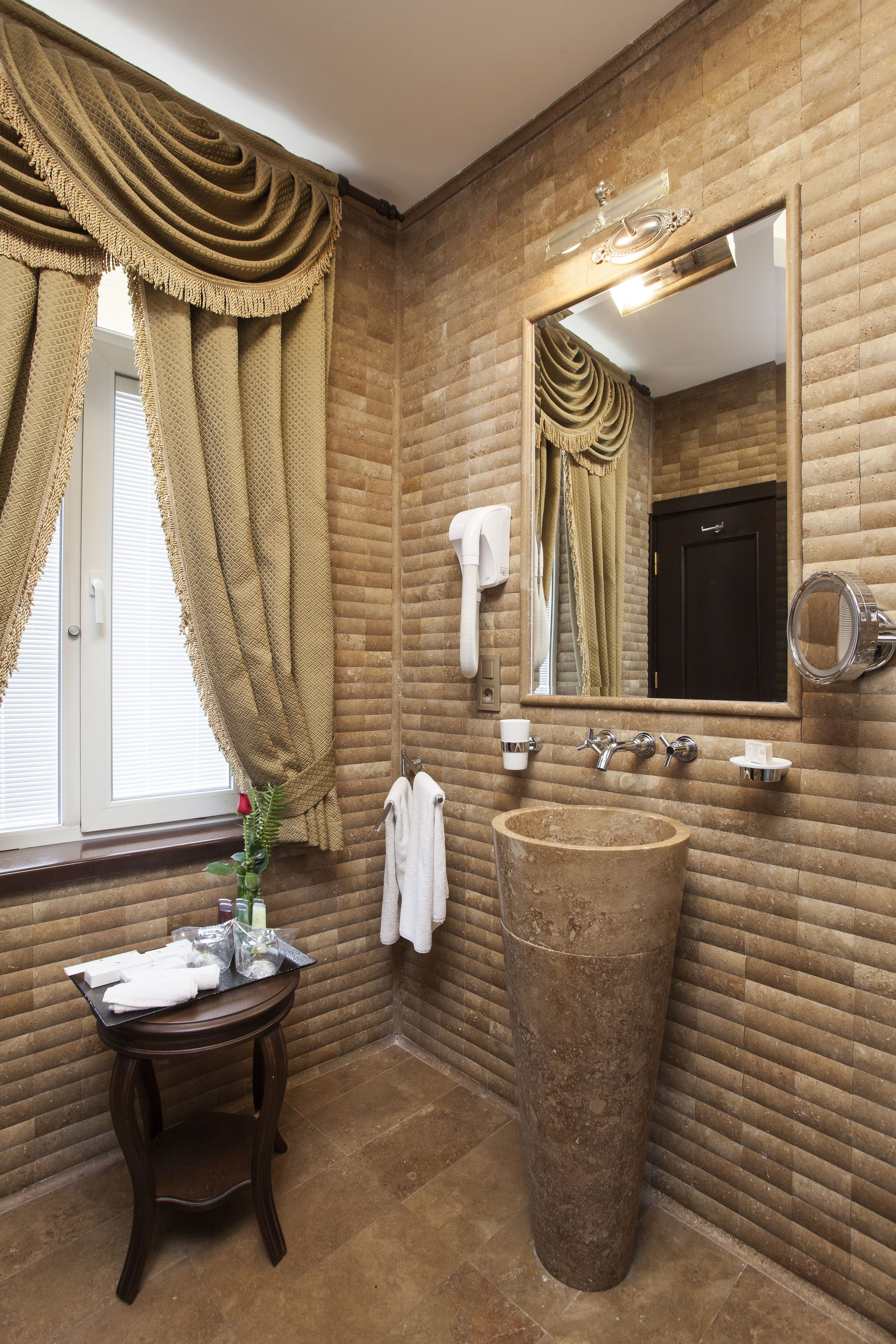 premium sultan junior suite | bathroom | designer toiletries, hair dryer, bathrobes, slippers