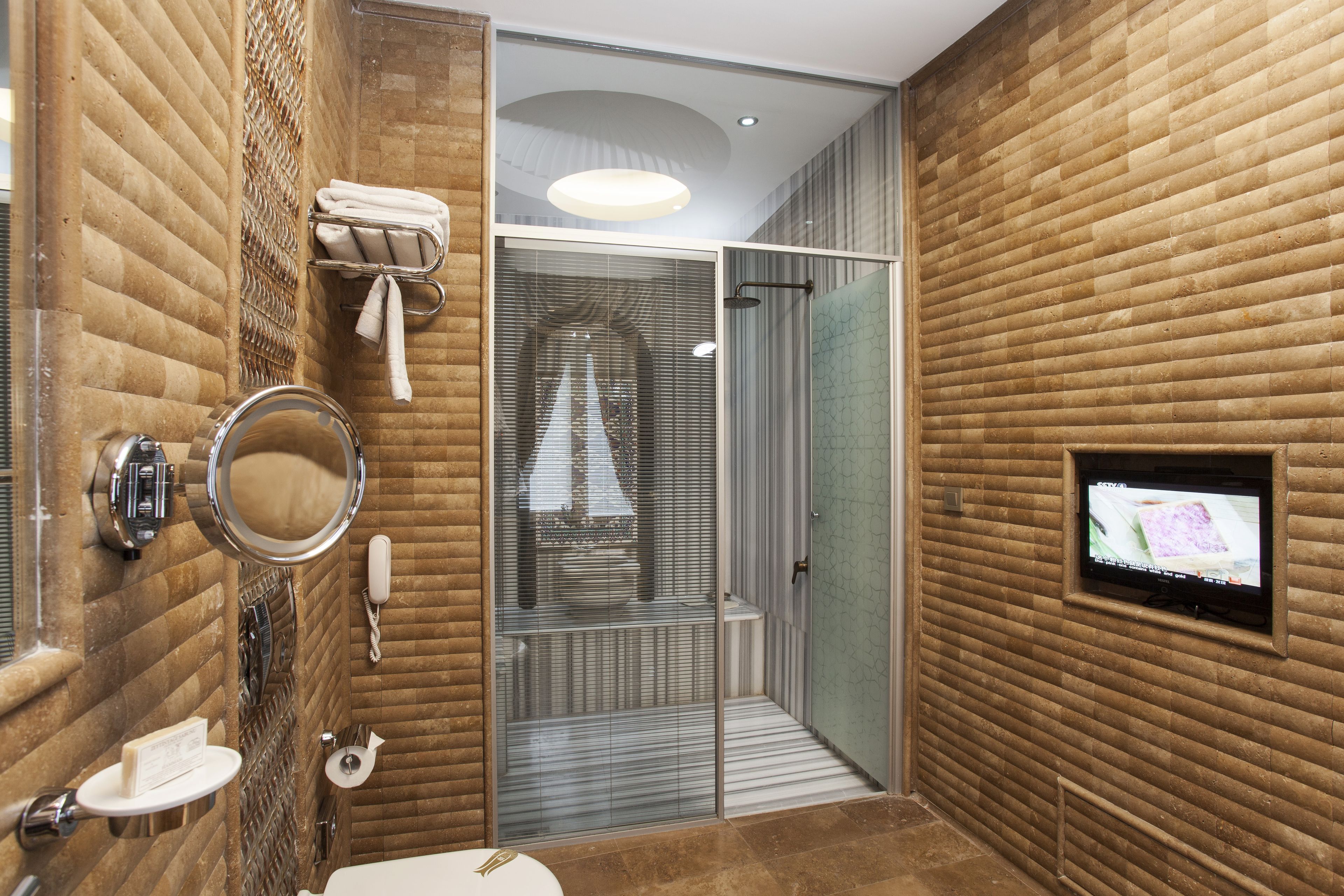 premium sultan junior suite | bathroom | designer toiletries, hair dryer, bathrobes, slippers