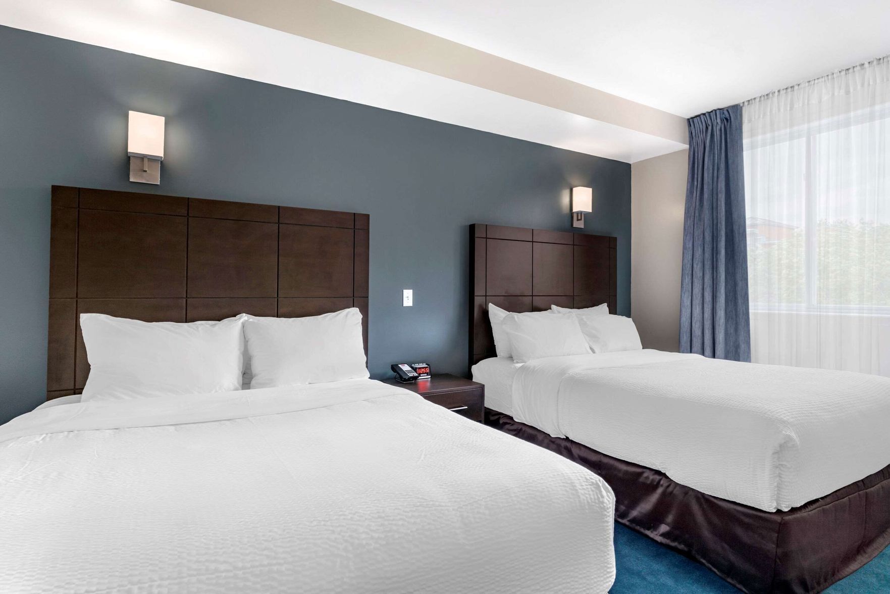 Premium bedding, down duvets, Select Comfort beds, desk