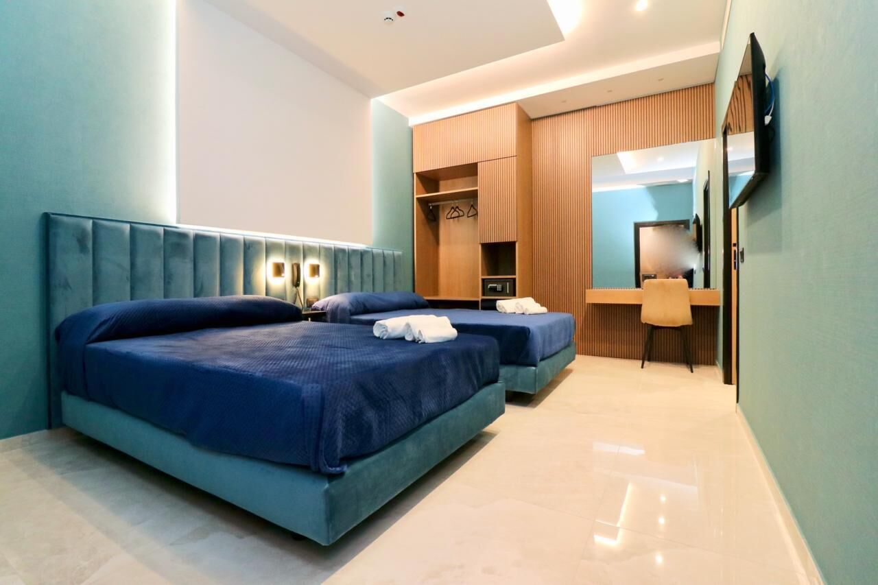 Deluxe trippelrum | Värdeförvaringsskåp på rummet, skrivbord, gratis wi-fi och sängkläder