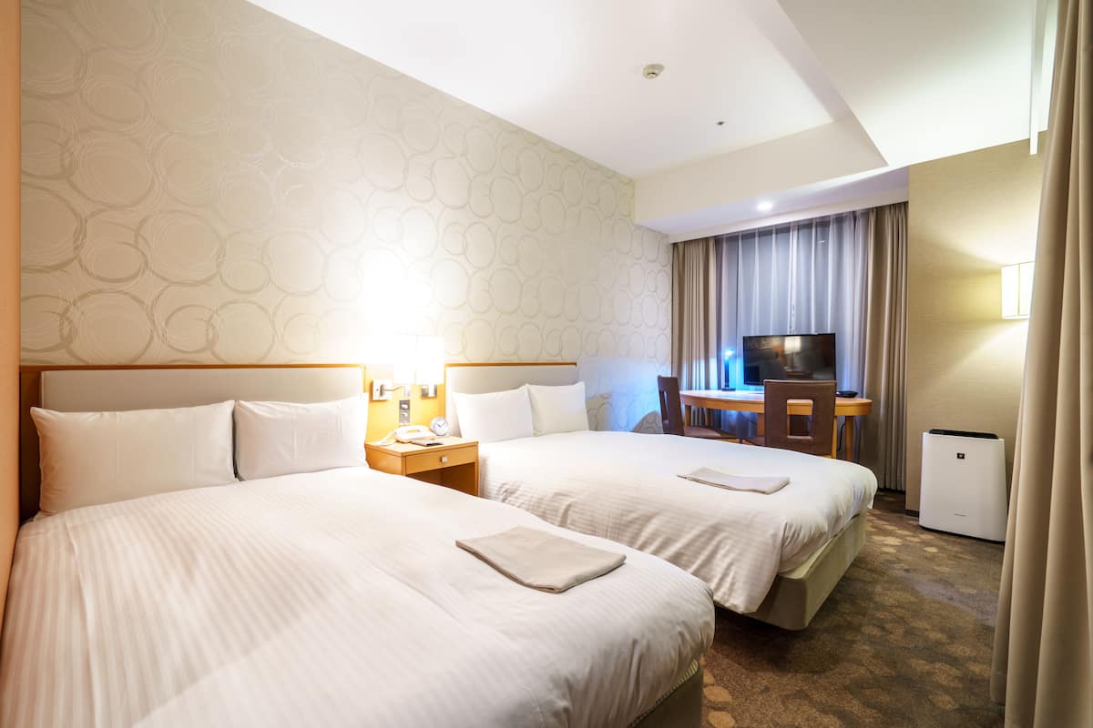 Premium bedding, down duvets, individually decorated