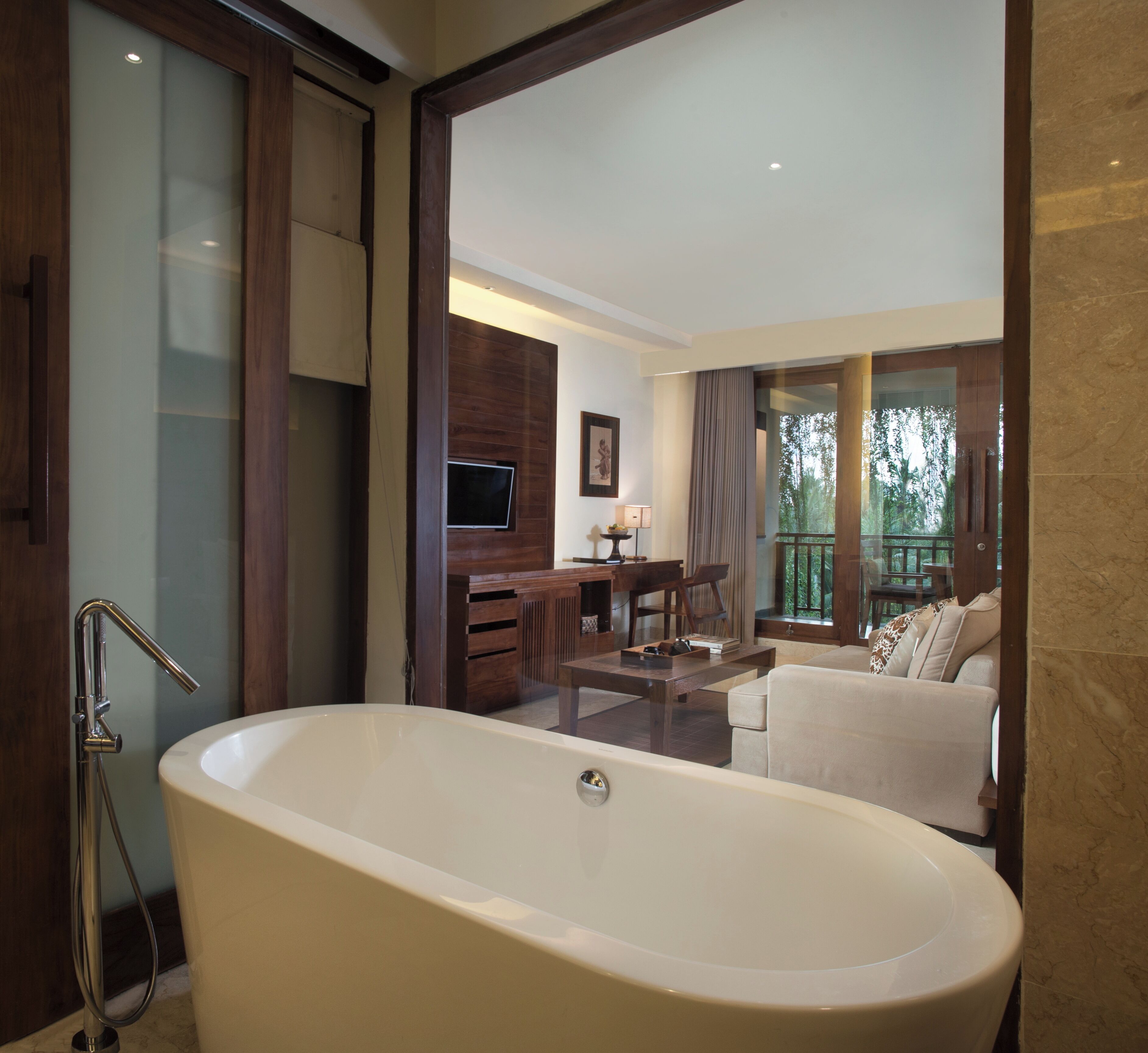 junior suite, pool view | minibar, in-room safe, desk, blackout curtains