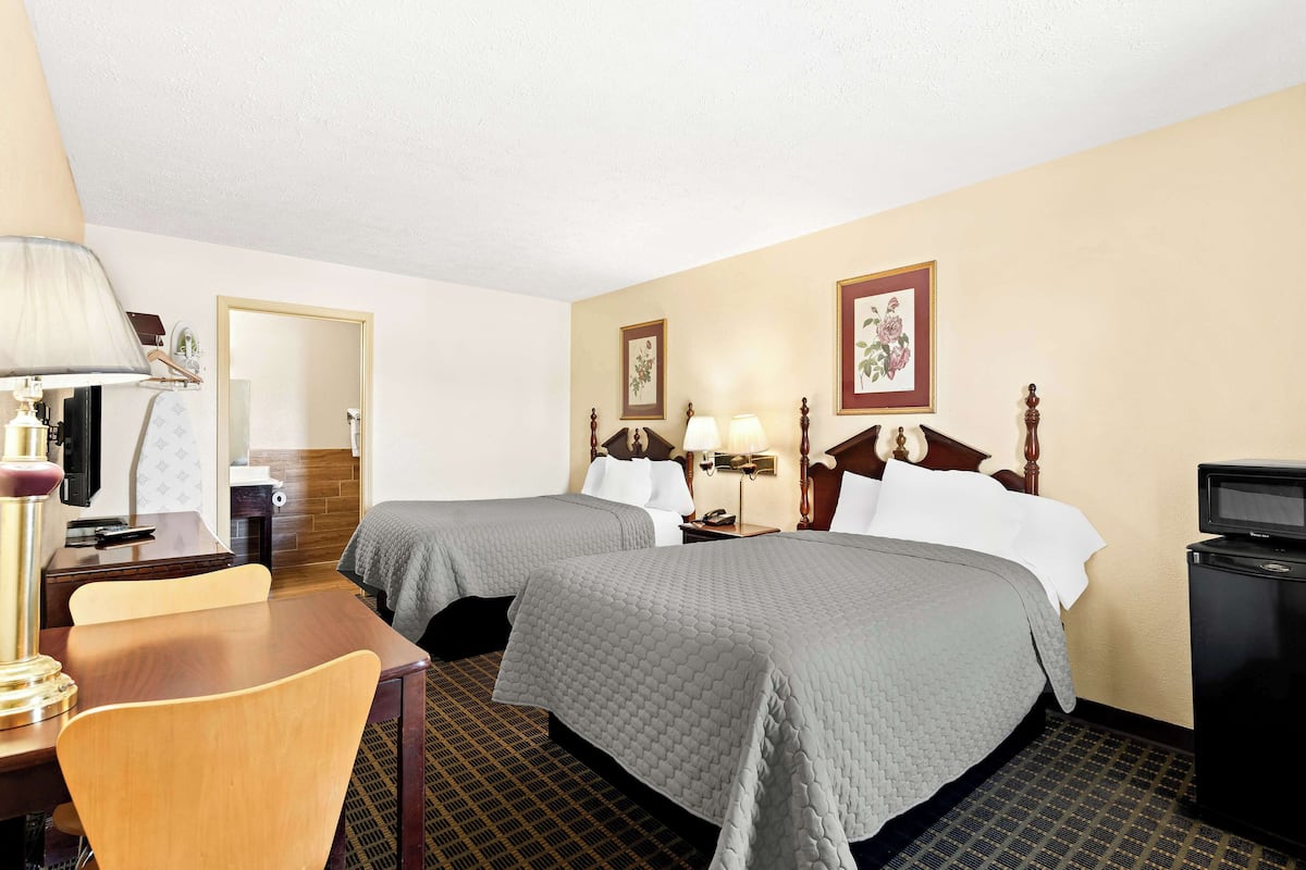 Room, 2 Double Beds | Blackout drapes, iron/ironing board, WiFi (free), bed sheets
