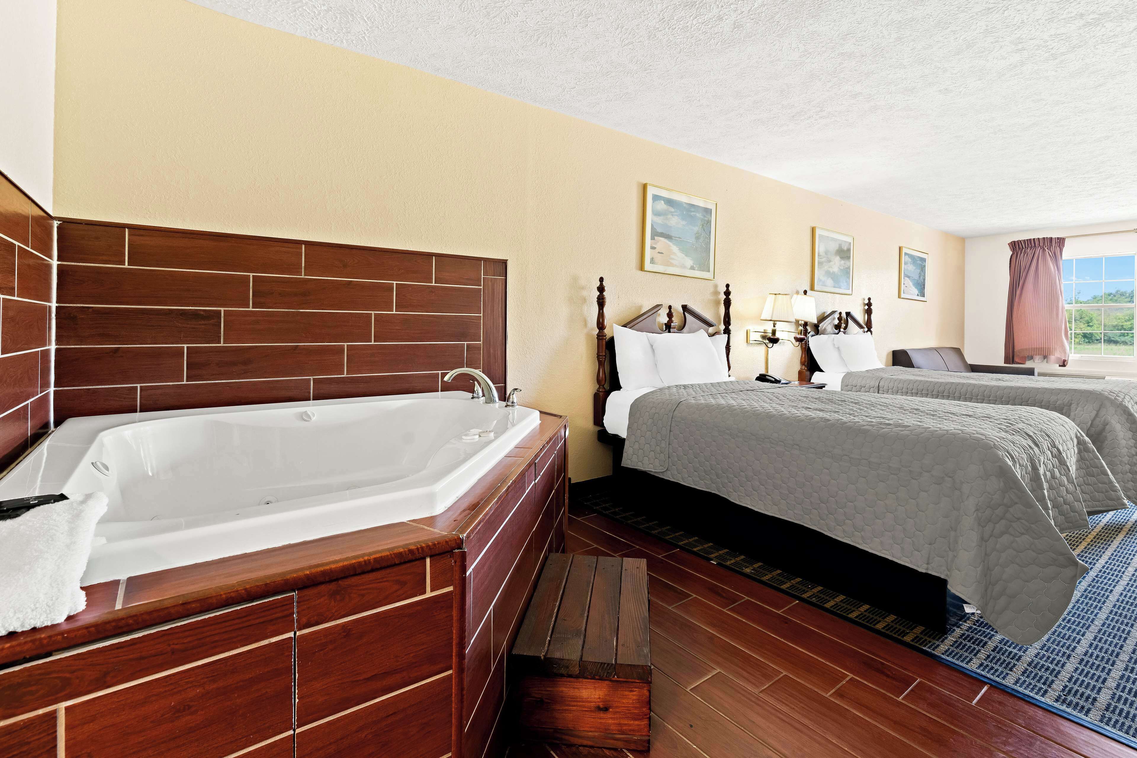 Room, 2 Double Beds | Blackout drapes, iron/ironing board, free WiFi, bed sheets