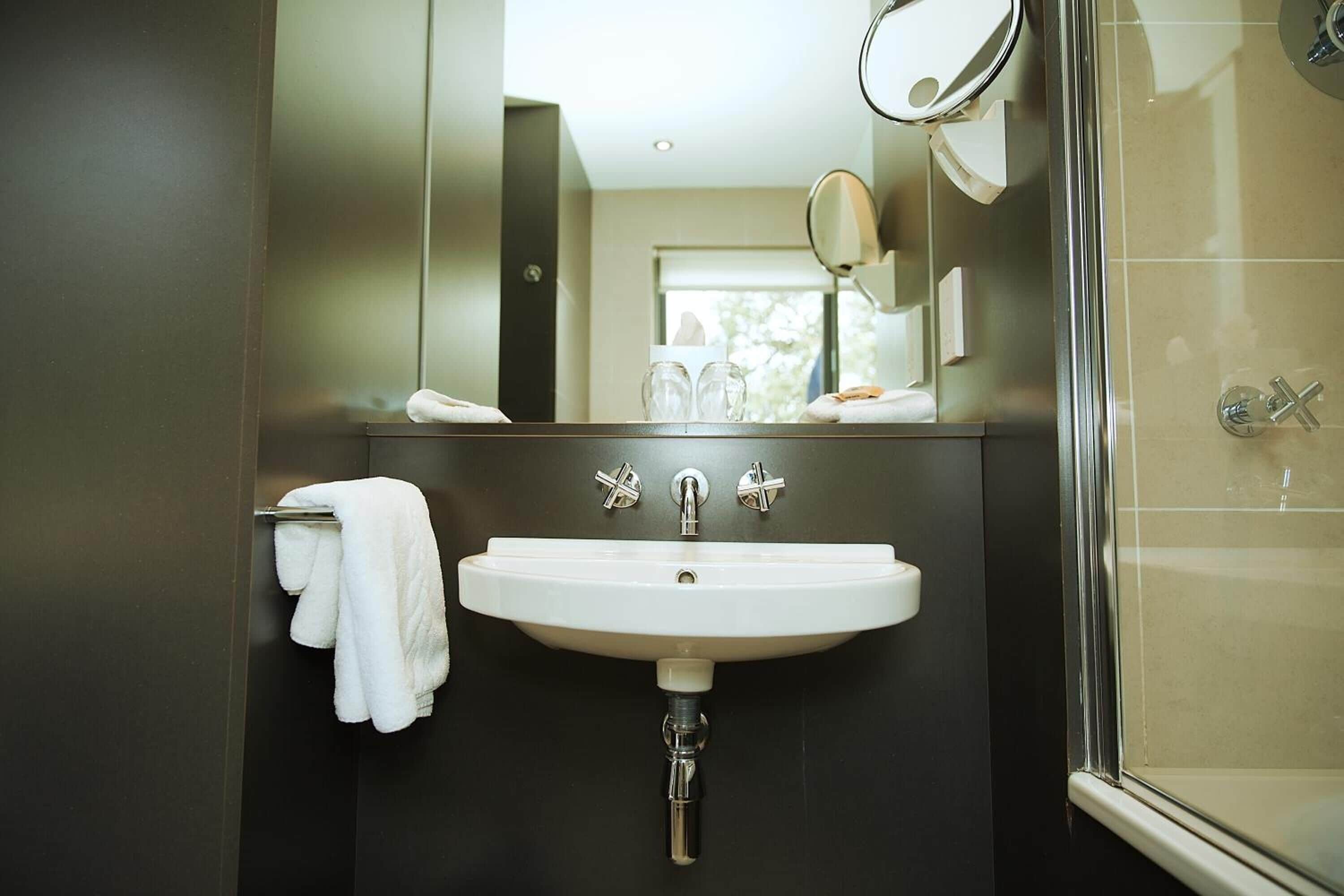 combined shower/bathtub, free toiletries, hair dryer, bathrobes