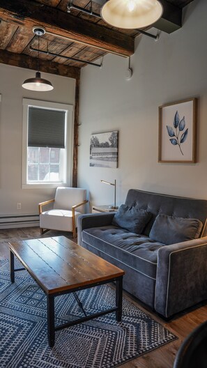 Room (The River Walk Suite) | Living area | 40-inch LCD TV with cable channels, TV, Hulu