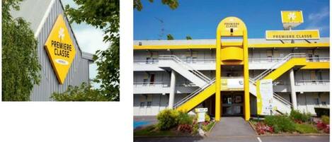 A building with a prominent yellow sign reading "PREMIERE CLASSE" and a staircase leading to the entrance.