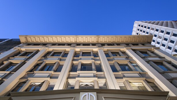 A building with a beige facade, large windows, and a Miller Apartments sign. - Miller Apartments Adelaide (Adelaide)