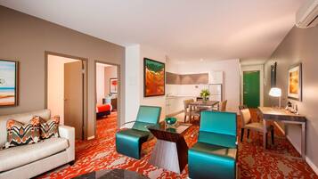 Executive Suite, 2 Bedrooms, Balcony | Living room | 40-inch LED TV with digital channels, TV