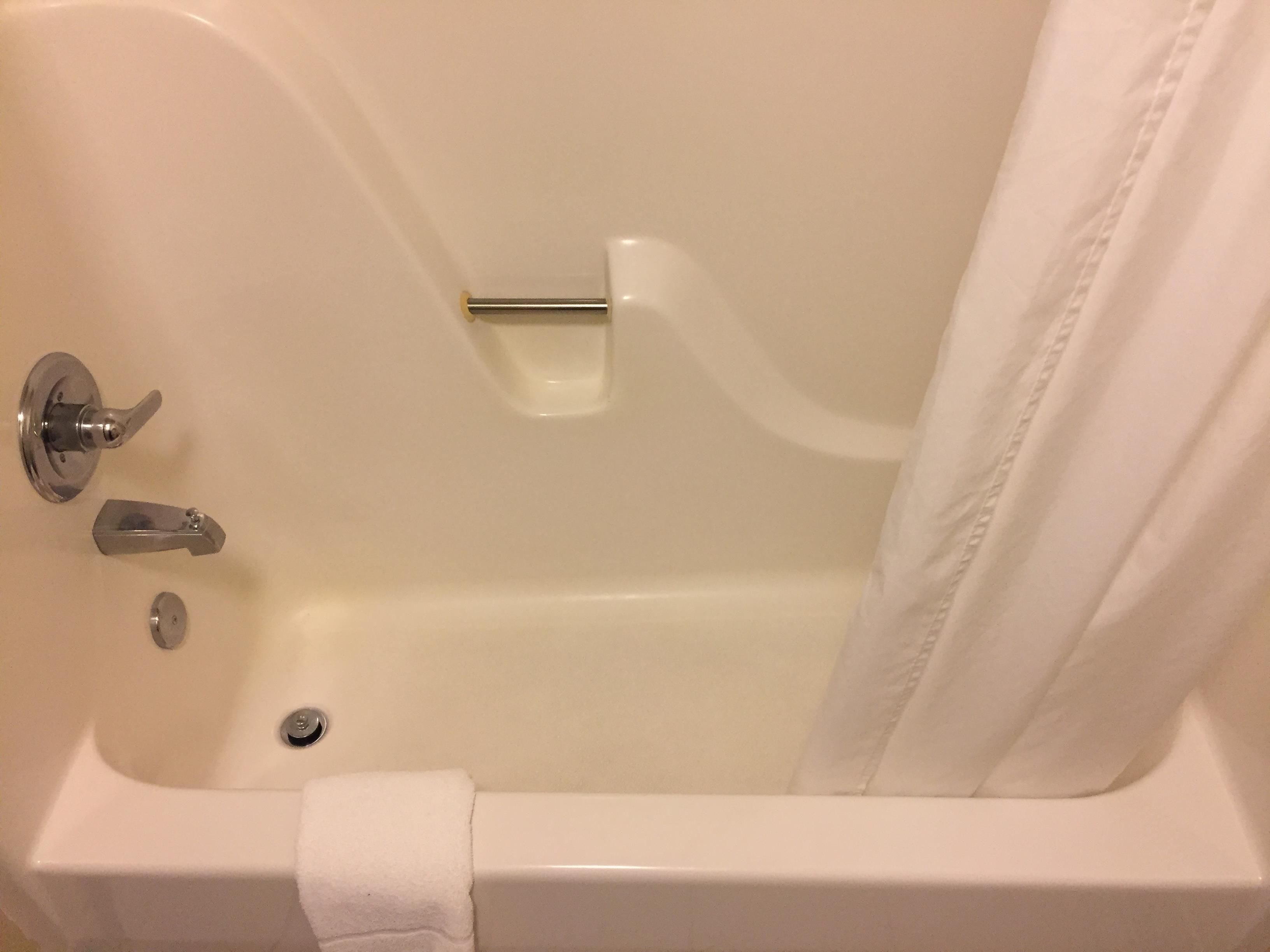 combined shower/bathtub, hair dryer, towels