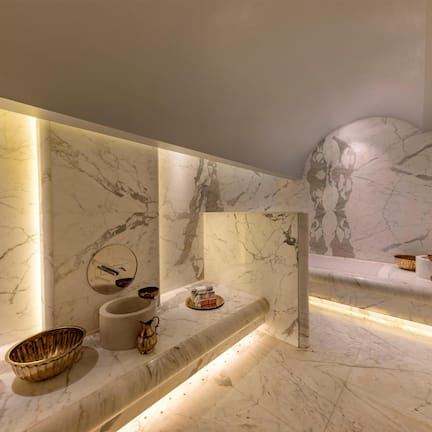 Designer toiletries, hair dryer, bathrobes, slippers