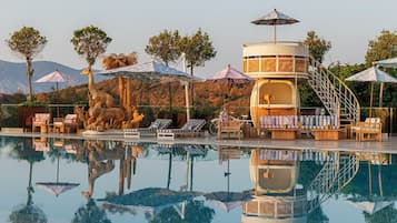 Indoor pool, outdoor pool, free pool cabanas, pool loungers