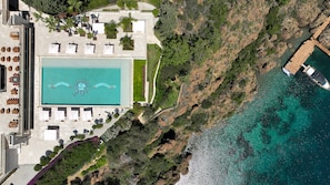 Indoor pool, outdoor pool, free pool cabanas, pool loungers