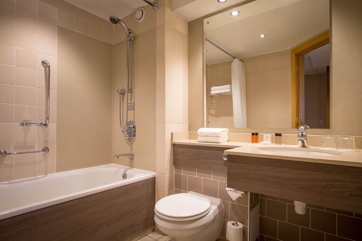 shower, eco-friendly toiletries, hair dryer, towels