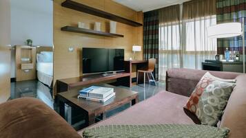 1 dormitorio, edredones de plumas, minibar y caja fuerte