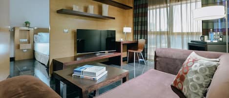 1 dormitorio, edredones de plumas, minibar y caja fuerte