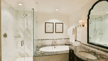 Designer toiletries, hair dryer, bathrobes, slippers