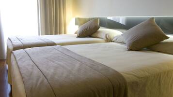 Down duvets, minibar, in-room safe, desk