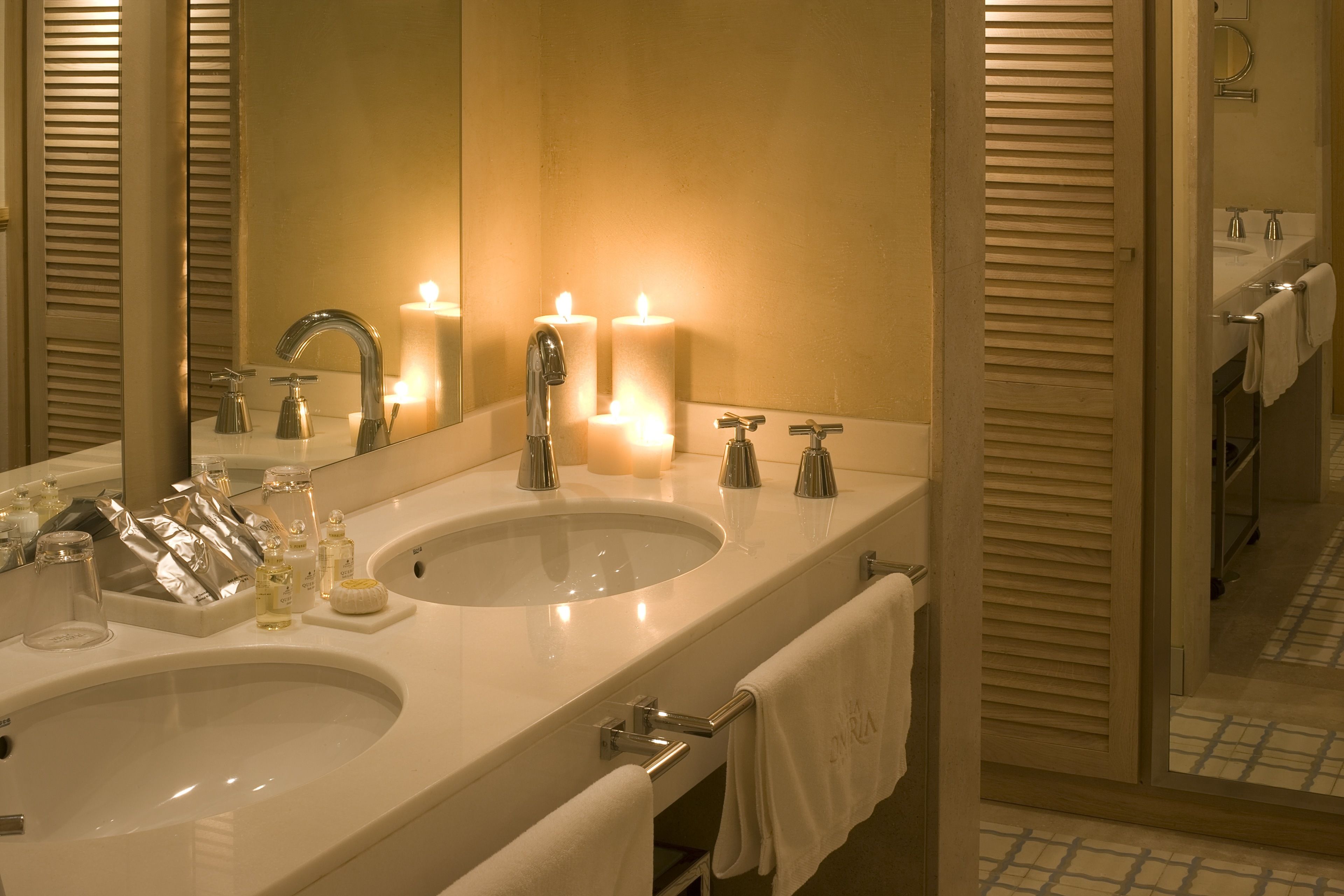 designer toiletries, hair dryer, bathrobes, bidet