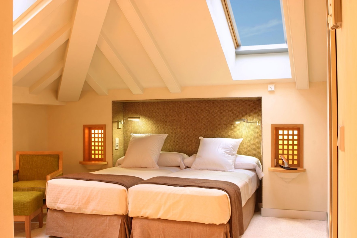 Down comforters, memory foam beds, minibar, in-room safe