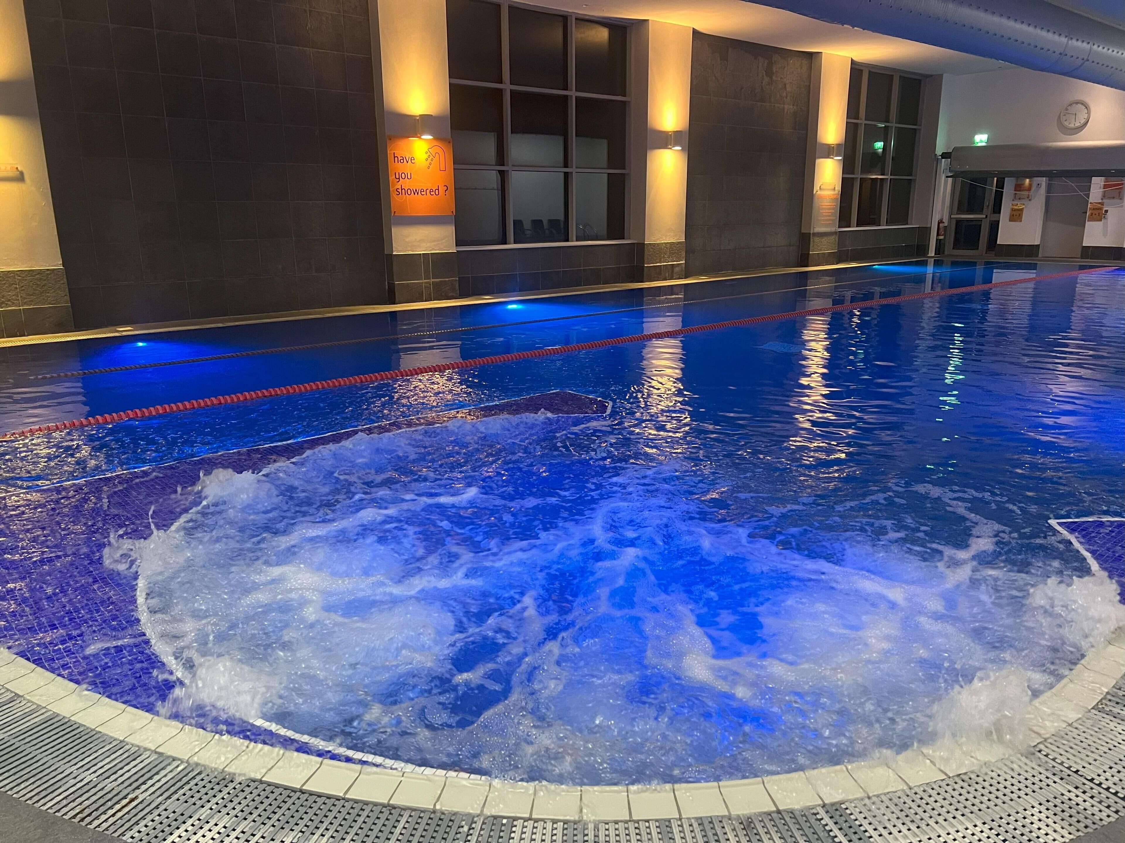 Indoor pool, open 6:00 AM to 10:00 PM, pool umbrellas, pool loungers