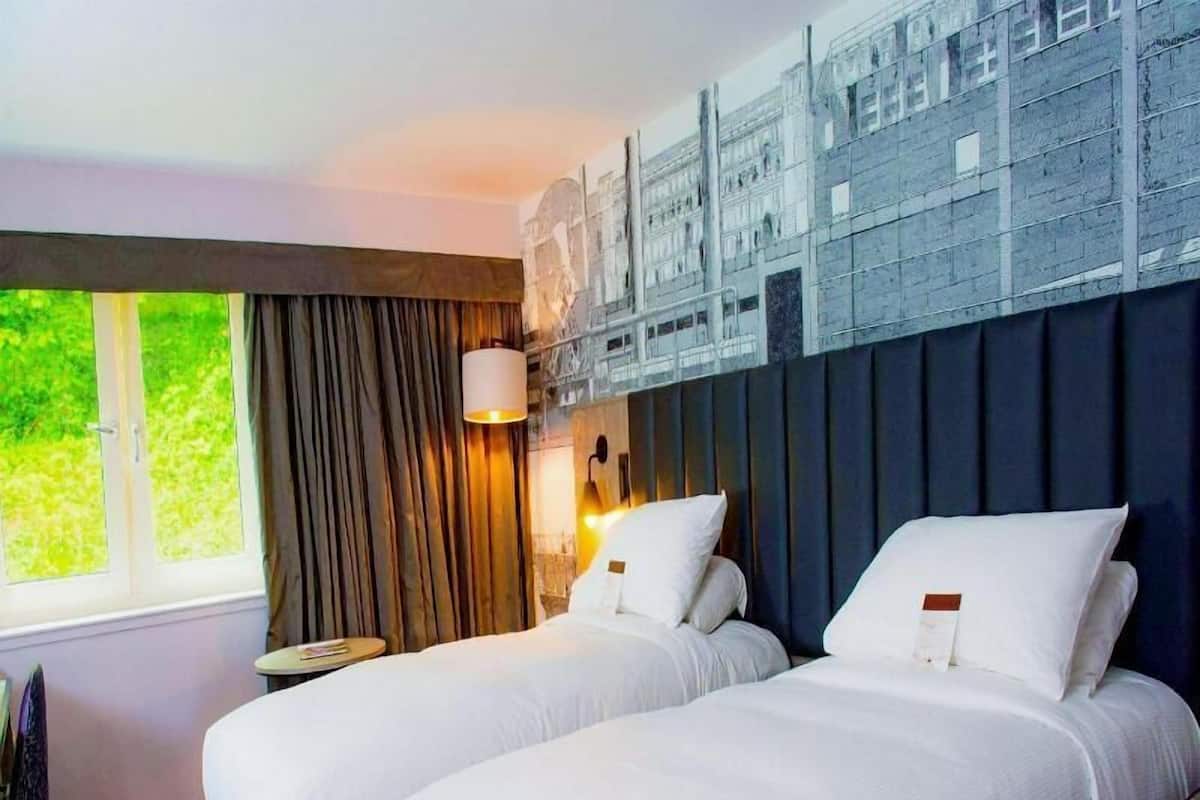 In-room safe, desk, iron/ironing board, free cribs/infant beds