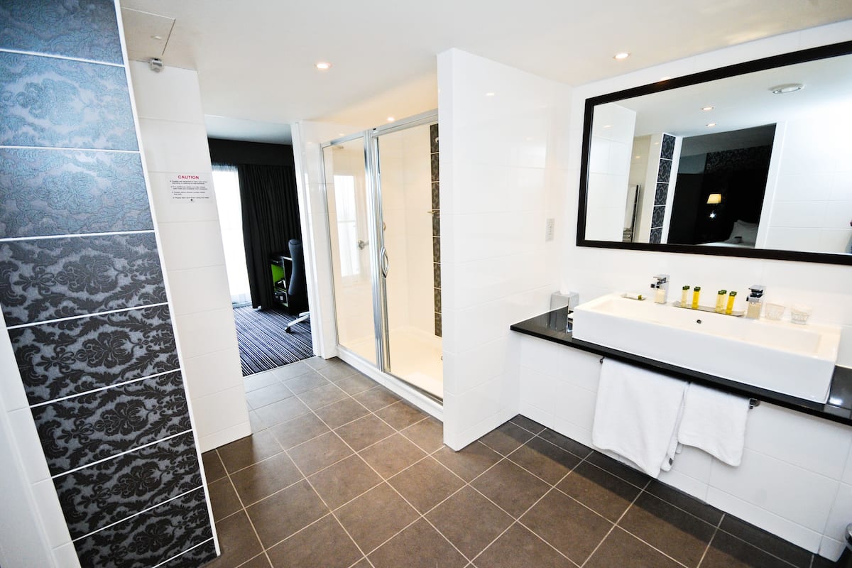 panoramic suite | bathroom | designer toiletries, hair dryer, towels