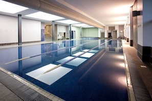 Indoor pool, open 6:00 AM to 10:00 PM, pool umbrellas, pool loungers