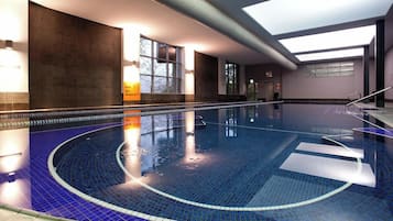 Indoor pool, open 6:00 AM to 10:00 PM, pool umbrellas, sun loungers