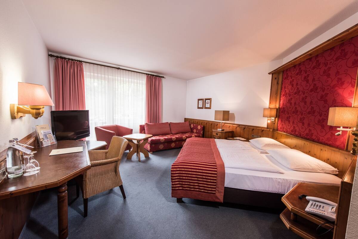 Comfort Double Room | Living area | Flat-screen TV