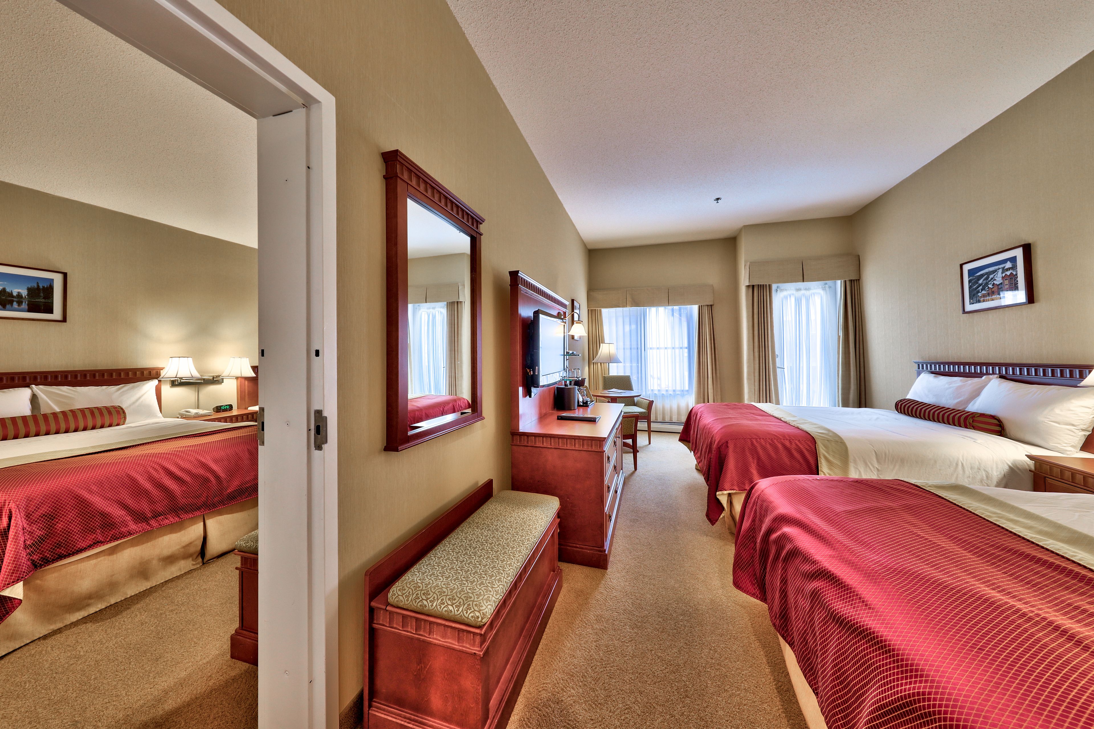 comfort room, 2 queen beds | 1 bedroom, in-room safe, blackout curtains, iron/ironing board