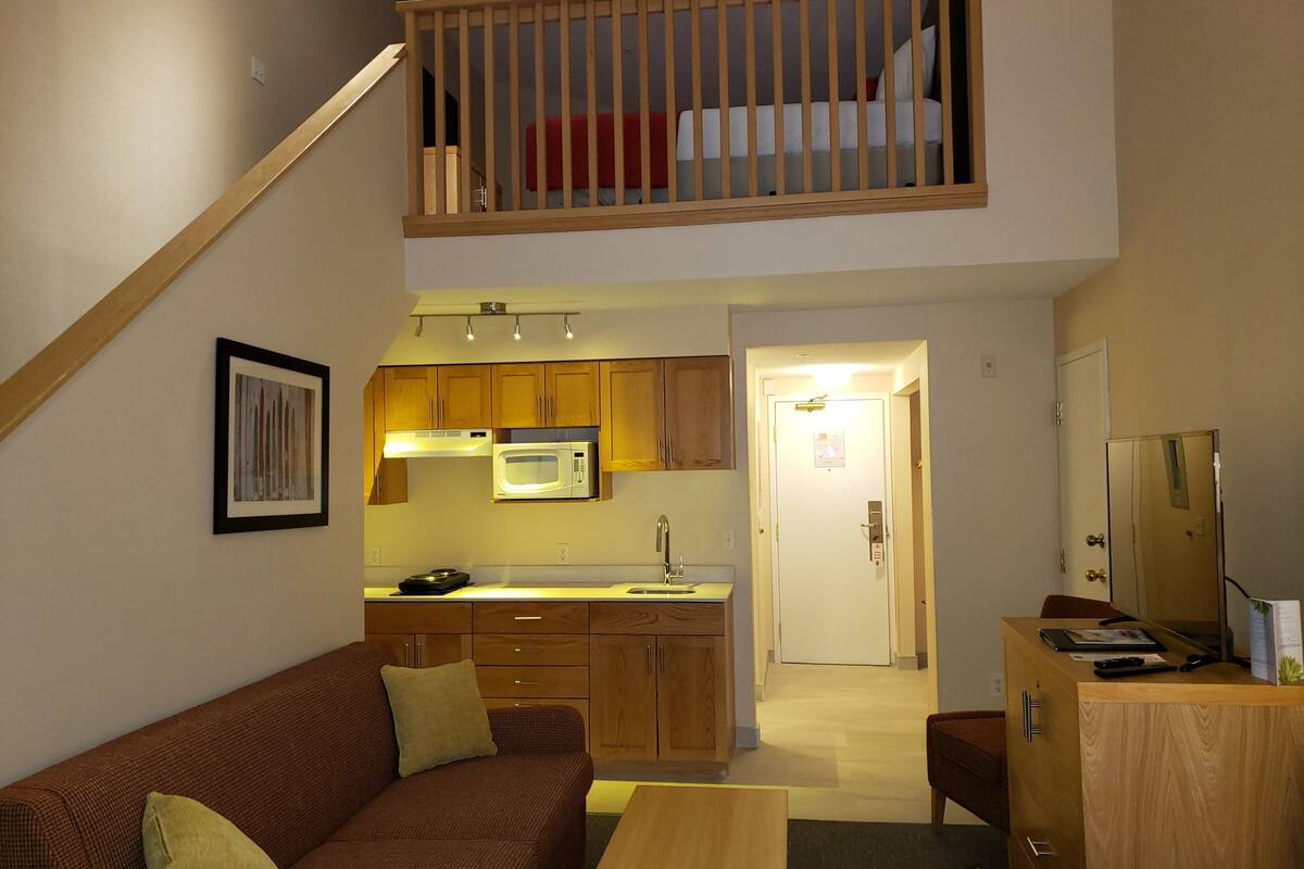 deluxe studio, multiple beds | 1 bedroom, in-room safe, blackout curtains, iron/ironing board