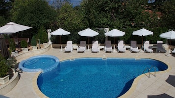Outdoor pool, open 10 AM to 7 PM, sun loungers