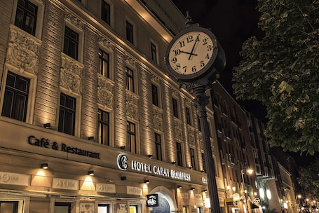 Front of property – evening/night. Carat Boutique Hotel