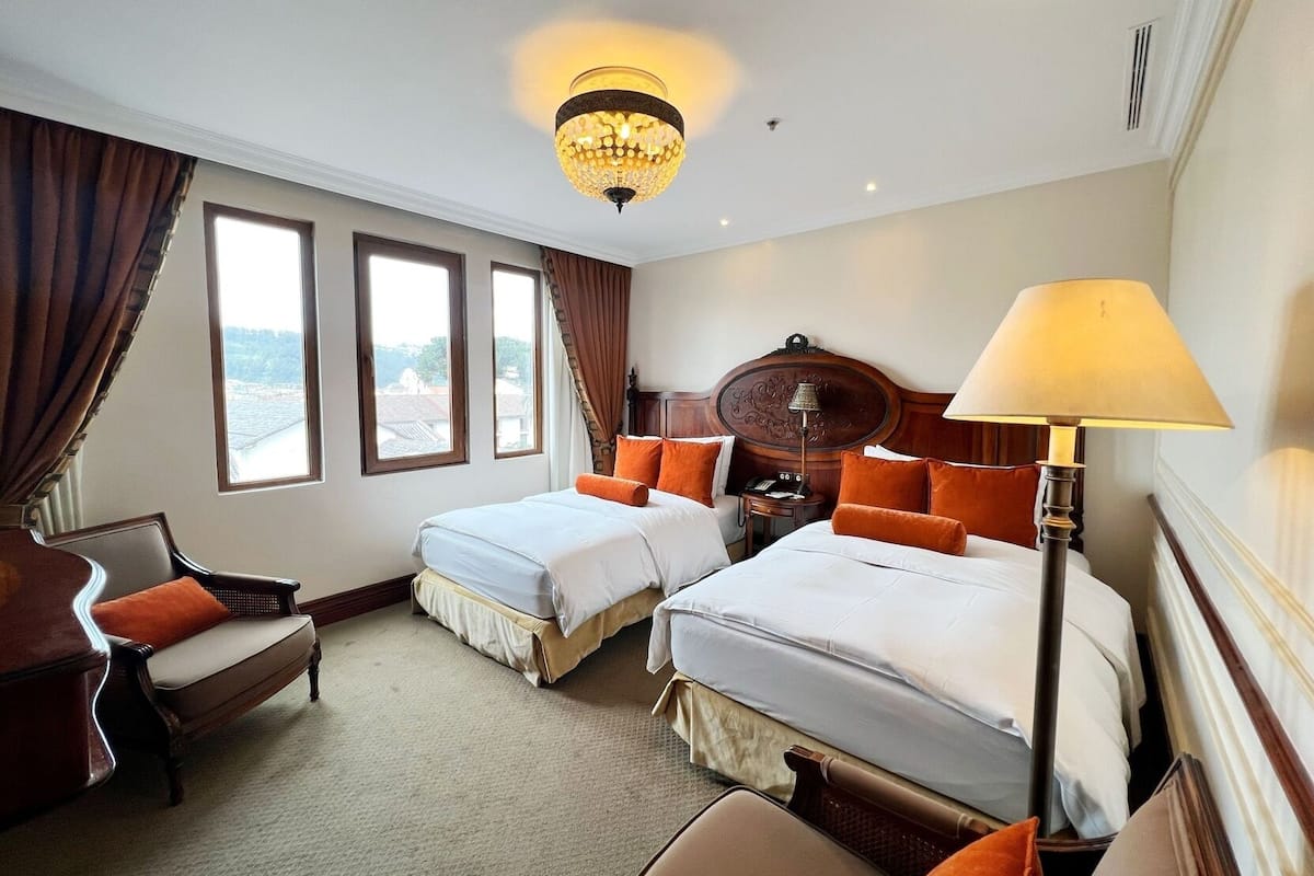 1 quarto, roupas de cama premium, edredons de pluma, cofres nos quartos