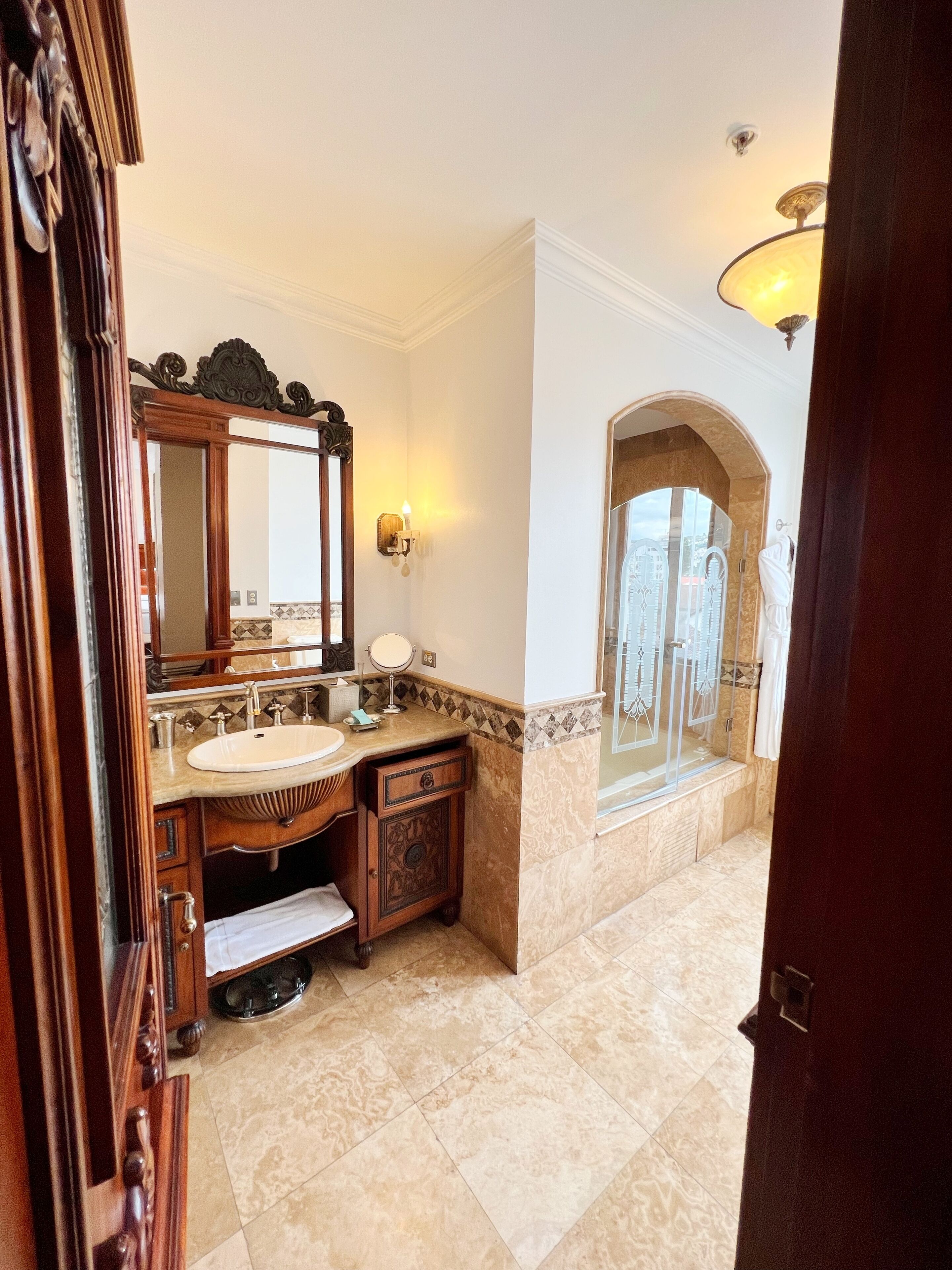 royal suite, 2 single beds, courtyard area | bathroom | combined shower/bathtub, jetted bath, rainfall showerhead, hair dryer