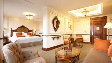 Royal Suite, 1 King Bed | Living area | 40-inch LED TV with cable channels, TV